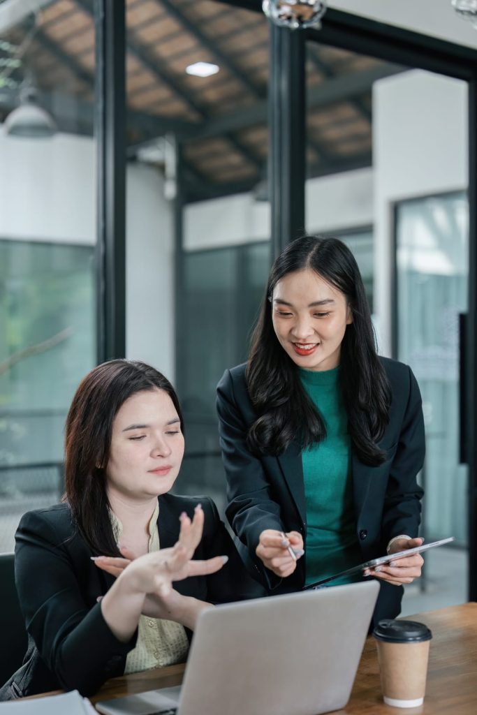 94420854_multicultural-female-professionals-discussing-project-strategies-and-enhancing-teamwork-in-a-bright-office Women empowerment at business image